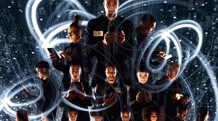 Diversity Multiple individuals in dark suits engage with phones against a digital cityscape backdrop.