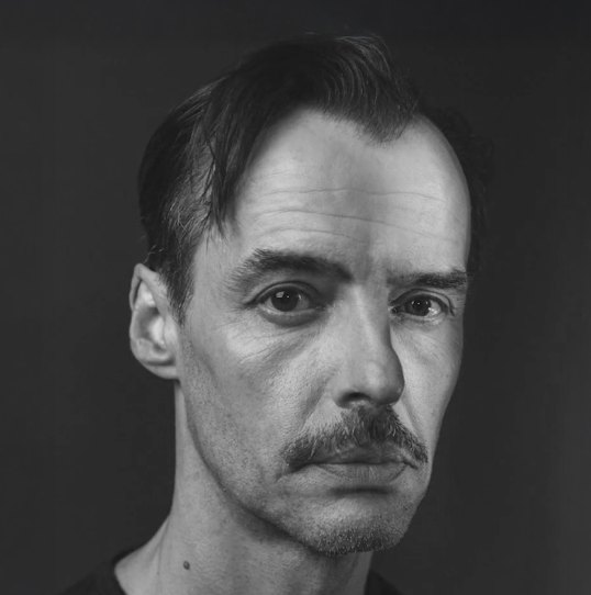 Paul Hilton as Ebenezer Scrooge